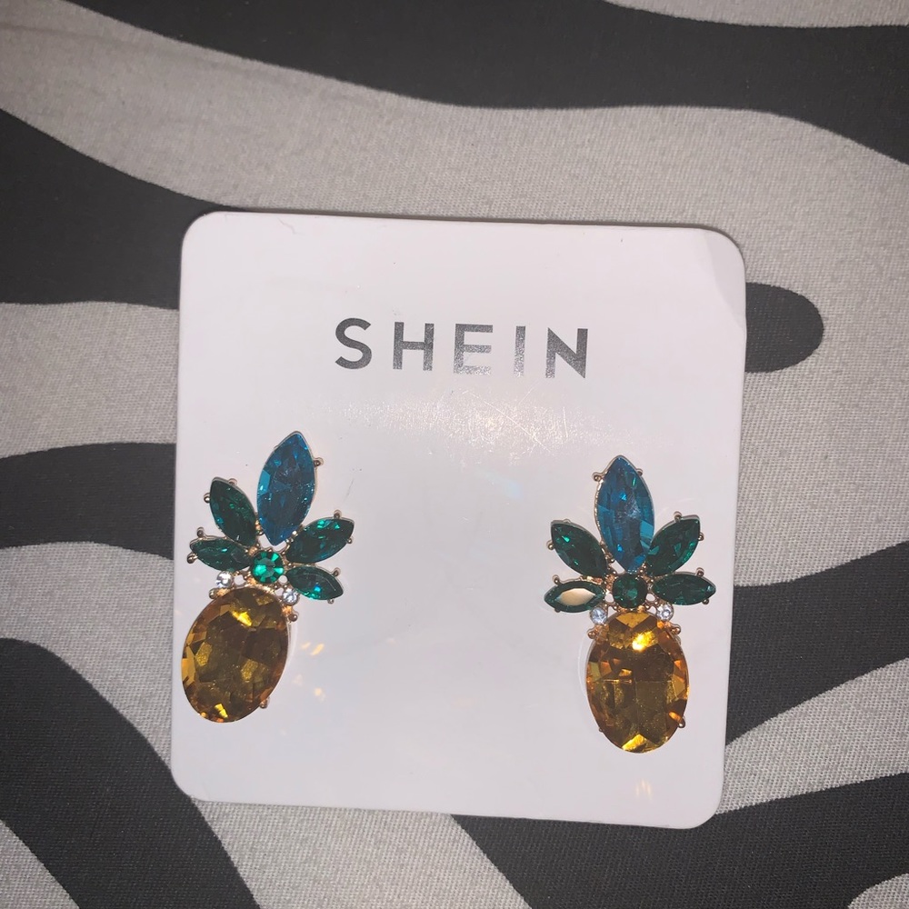 Pineapple earrings.